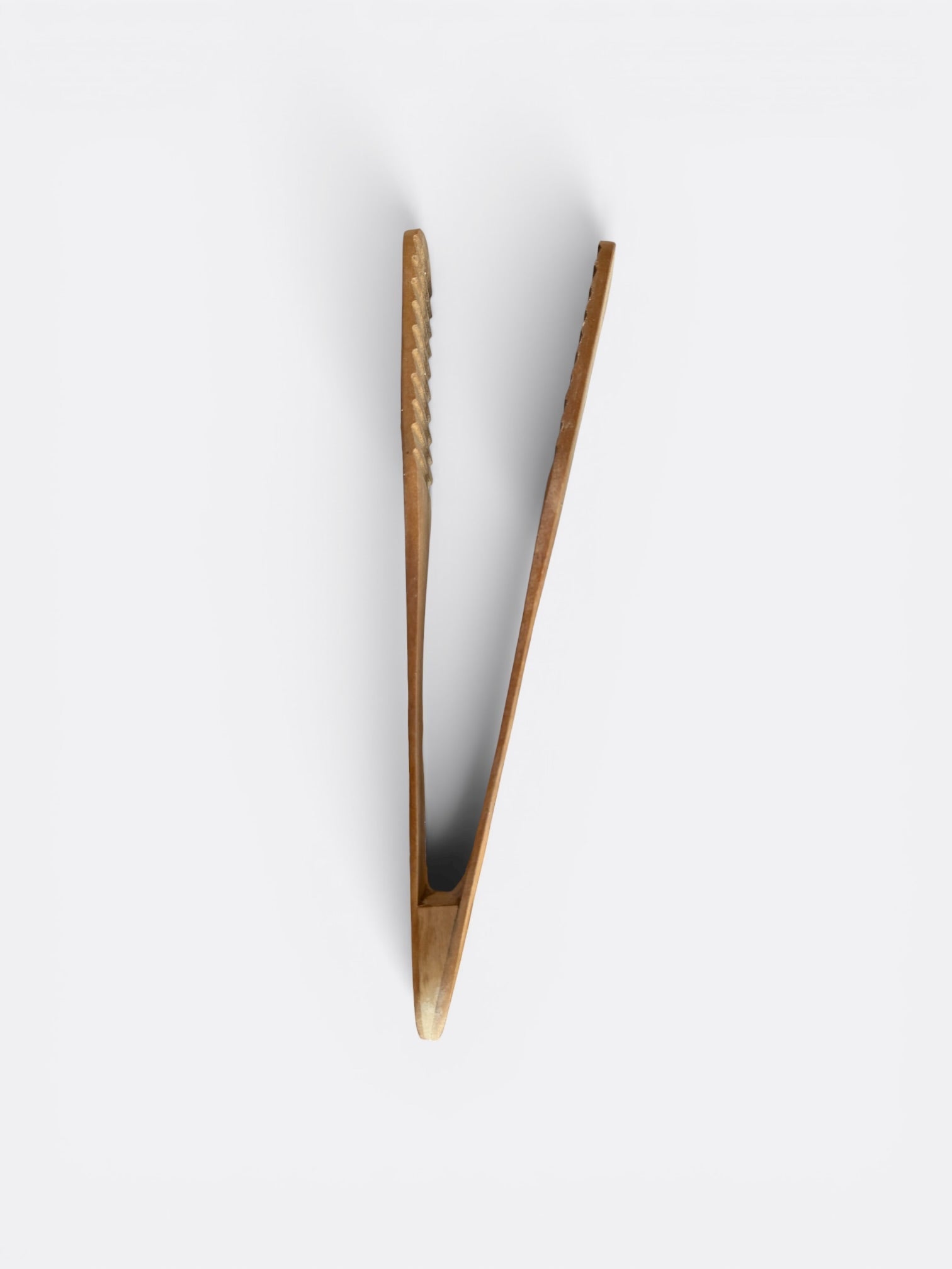 Pince en bois de teck artisanale