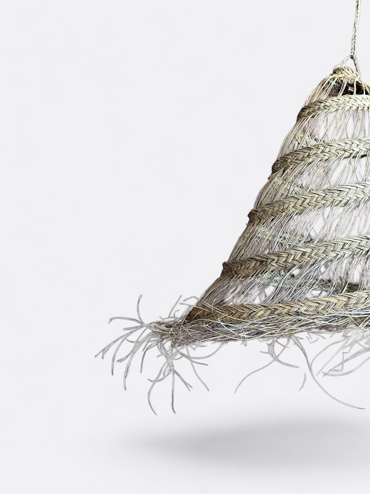Détail du tressage de fibre de dattier de Mirah
