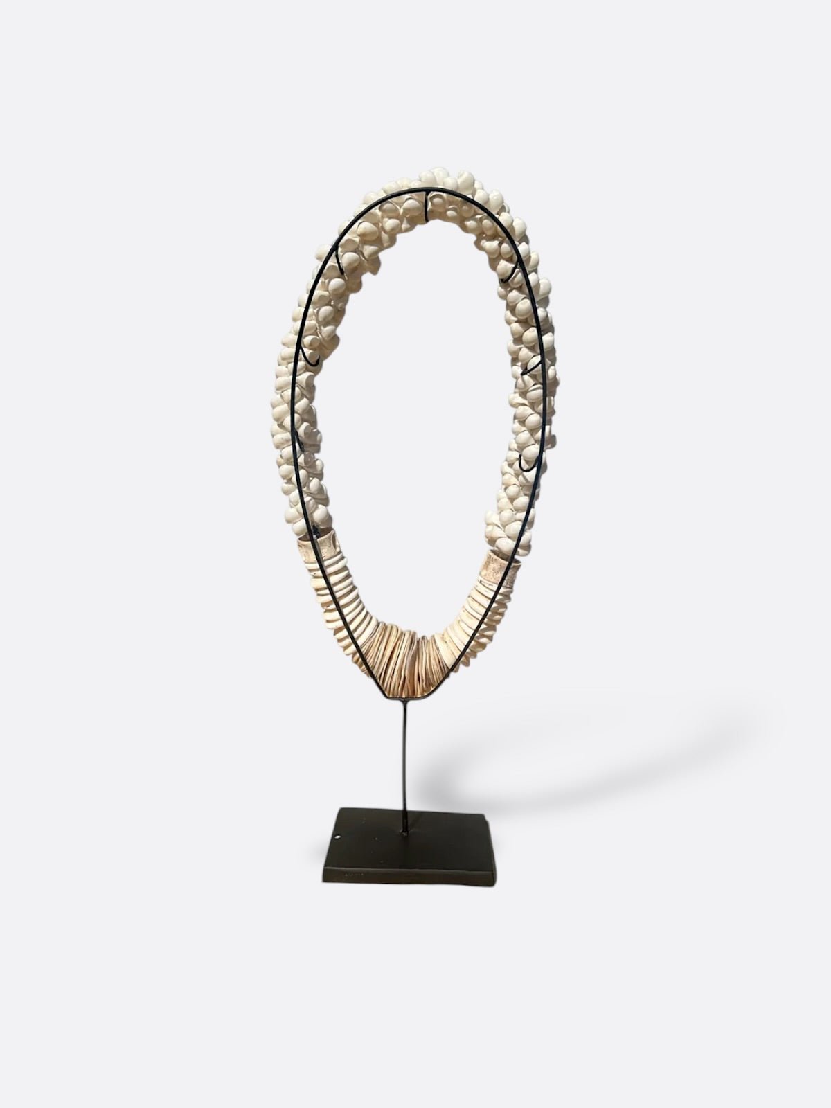 Détail des coquillages du collier Batur