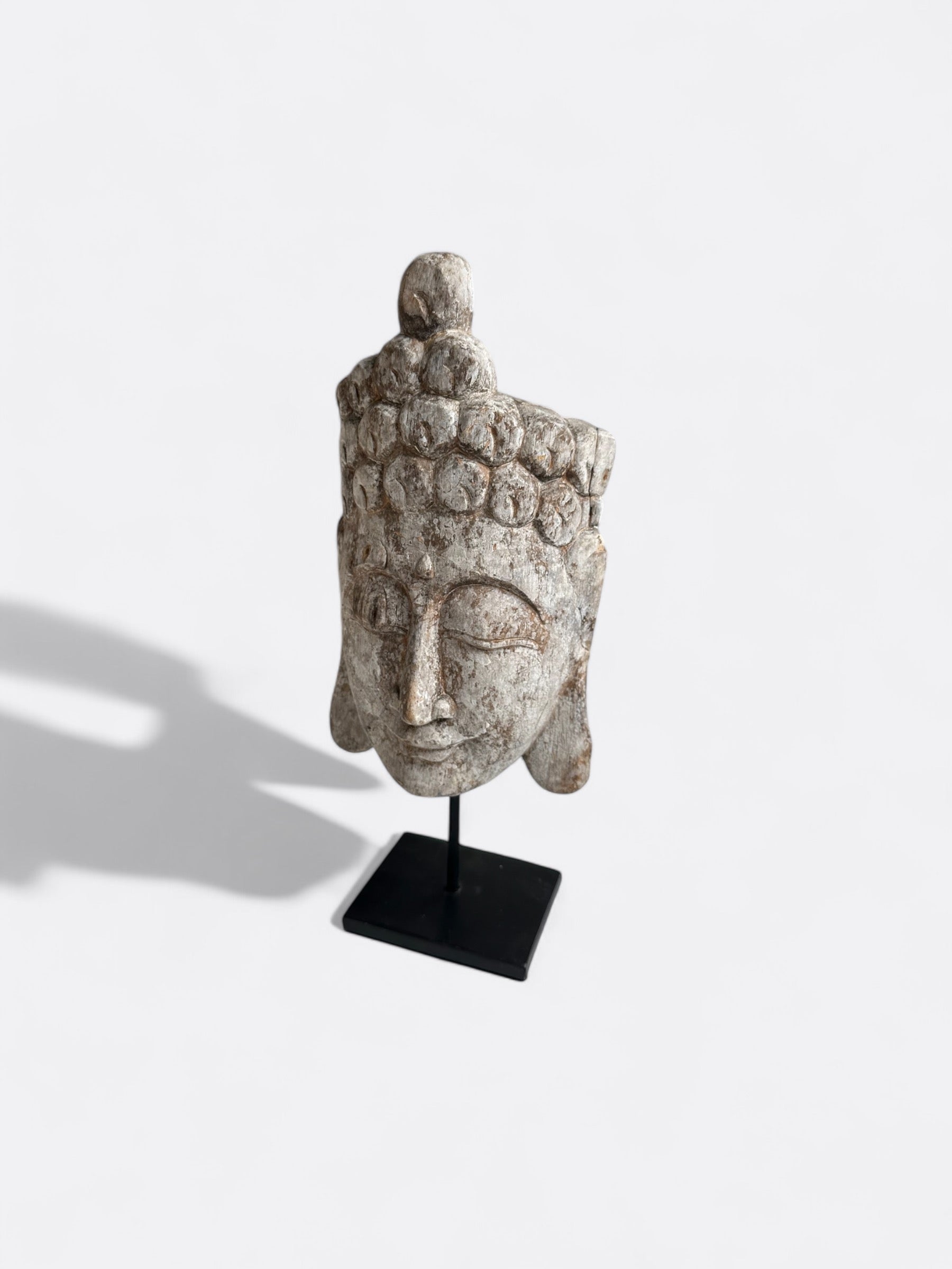 Détail des yeux fermés de la sculpture Bouddha