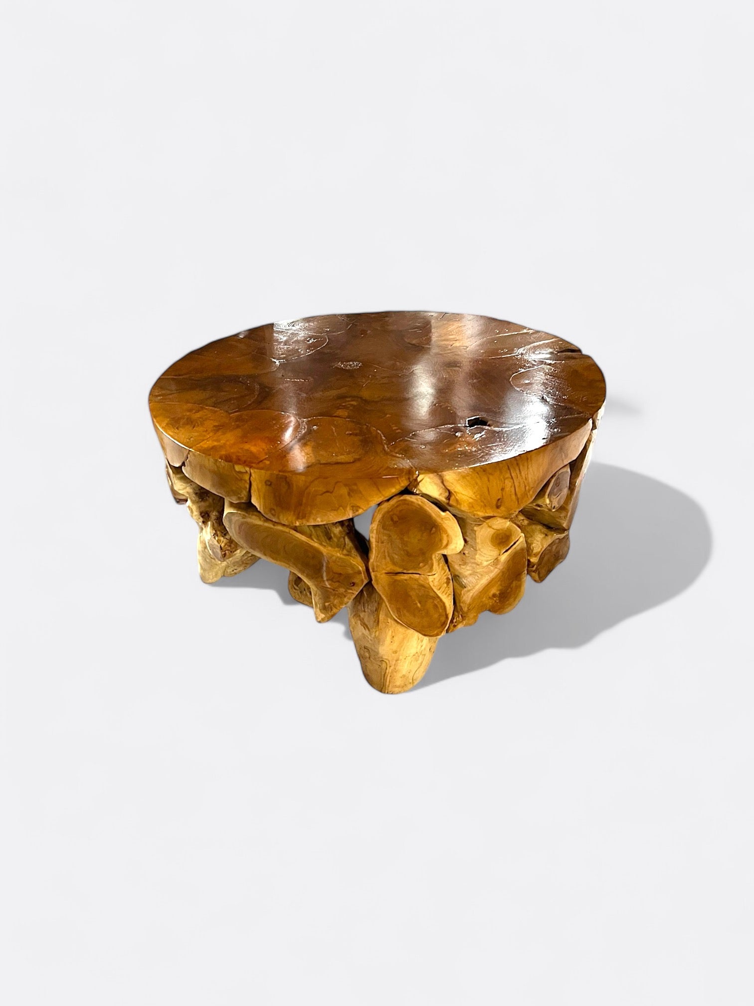 Table basse ronde Dhana en teck - vue de côté